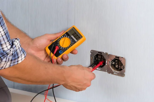 Male Electrician Checking Voltage Socket Multimeter House — Stock Photo, Image