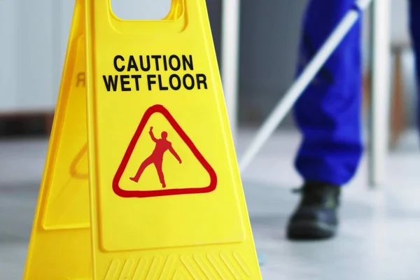 Caution: Wet Floor - Janitor Cleaning with Clean Techniques