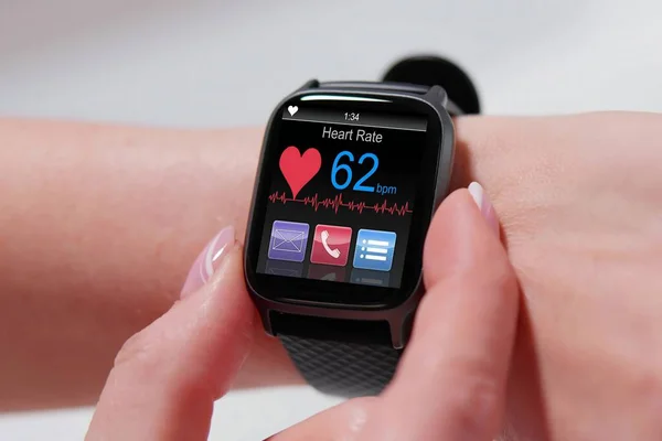 Smart wearable watch showing heartbeat for monitoring