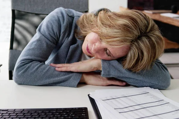 stock image An Older Employee Tired and Bored, Sleeping on the Job