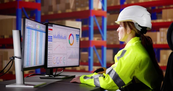 Warehouse Inventory Management On Office Computer. Supplier And Distribution Software