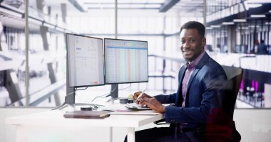 Data Analyst African Man Using Spreadsheet On Computer clipart