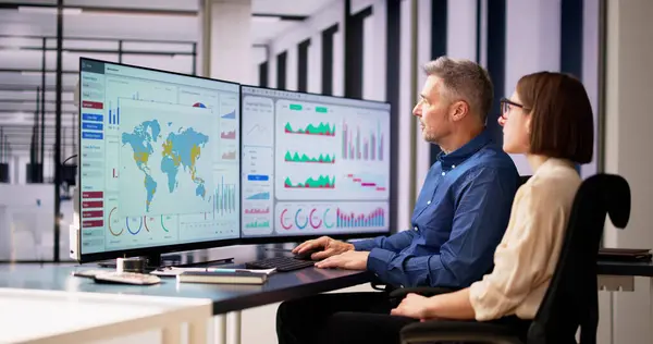 stock image Data Analyst Using Data Analytics KPI Dashboard