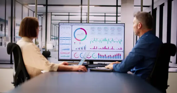 stock image Data Analyst Using Data Analytics KPI Dashboard