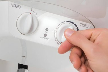 Isıtma için elektrikli su ısıtıcısının bakımı ve kurulumu