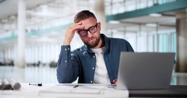 Stressed Sick Employee Man At Computer In Office