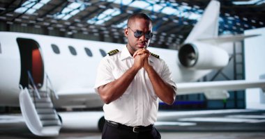 Christian Pilot Seeks God's Guidance Before Taking Flight Over Airport