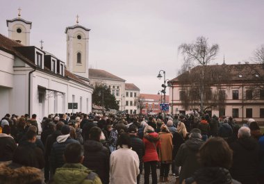 Cacak, Serbia - January 26, 2025: Protests in Serbia regarding the fall of a concrete canopy in Novi Sad where 15 people died. Citizens demand that the authorities take responsibility and punish those responsible for that event. clipart