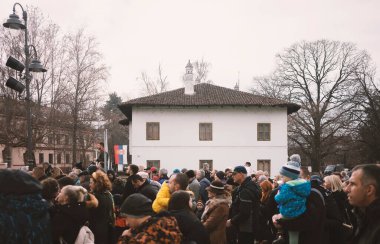 Cacak, Serbia - January 26, 2025: Protests in Serbia regarding the fall of a concrete canopy in Novi Sad where 15 people died. Citizens demand that the authorities take responsibility and punish those responsible for that event. clipart