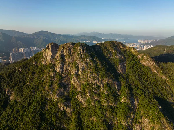 Drone fly over Hong Kong lion rock mountain