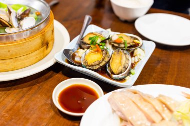 Traditional chinese food steamed chicken and abalone