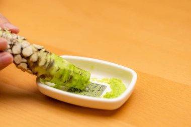 Japanese wasabi with grater for wasabi sauce clipart