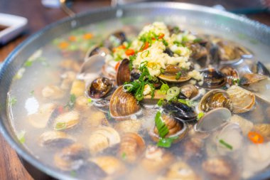 Seafood hot pot with clam