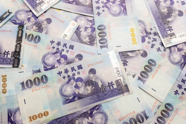 Lots Taiwan Dollar Table — Stock Photo, Image