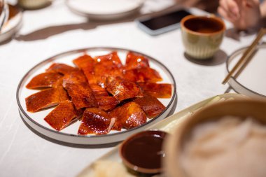 Peking duck dish in chinese restaurant