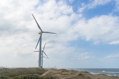 Tayvan 'ın Penghu kıyısında yel değirmeni parkı.