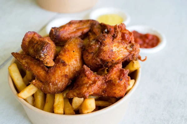 Deep fried chicken with fries