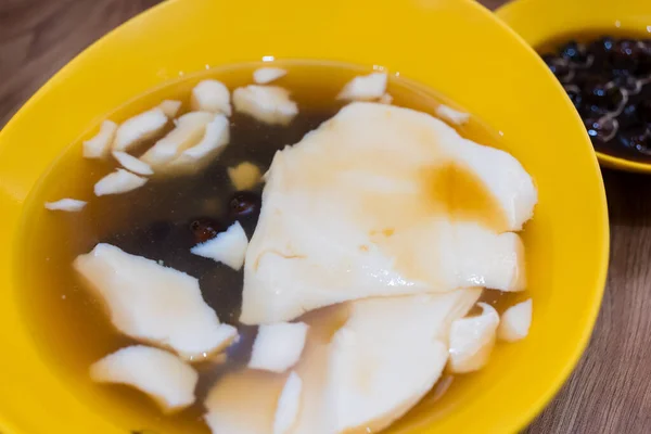 Tofu pudding with pearl in the black sugar soup