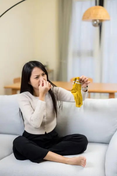 Woman Hold Smells Stinky Sock — Stock Photo, Image