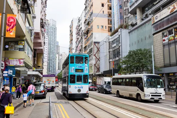 stock image Hong Kong 27 April 2024: People cross the street in Hong Kong Wan Chai district