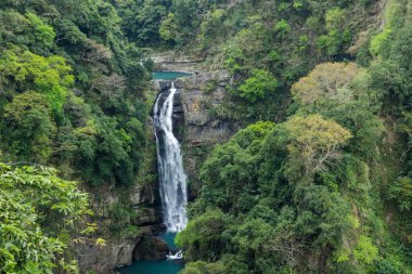 Beautiful waterfall scenery in Xiao Wulai Scenic Area at Taoyuan of Taiwan clipart