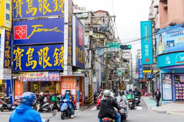 Taiwan 07 November 2024: City Intersection with Trees and Motor Vehicles Visible clipart