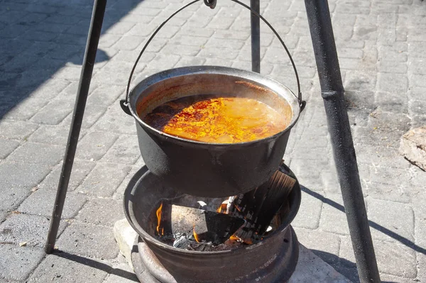 Cooking Soup Fire Large Cauldron City Street Holiday Treat Those — Stock Photo, Image