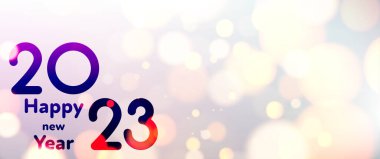 Banner with 2023 happy year sign on terli çimenler üzerinde renkli bokeh ışıkları arka planında. Metin için boşluk.
