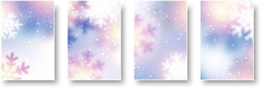 Parlak mavi ve beyaz arkaplanlı ışık parçacıkları olan bir takım kâğıt noel kartları. Odaklanmamış kar taneleri ile yeni yıl illüstrasyonu.