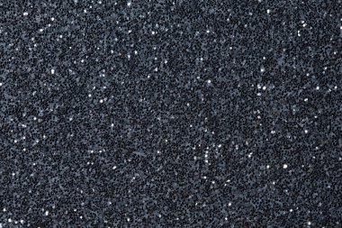 Parlak röfleli siyah parıltı yüzeyinin ayrıntılı görünümü, zarif, şenlikli veya lüks temalı tasarım projeleri için idealdir.