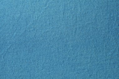 Yumuşak gökyüzünün makro görüntüsü. Mavi pamuk kumaş. İnce, hatta ince bir dokuyu gösteriyor..