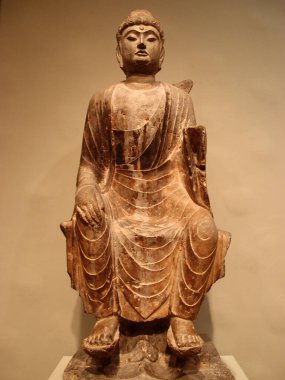 HonoluIu - February 5, 2013: Admire the beauty and serenity of this magnificent sculpture of the Buddha, now on display at the Honolulu Museum of Art. Immerse yourself in the timeless art and culture of the Far East.