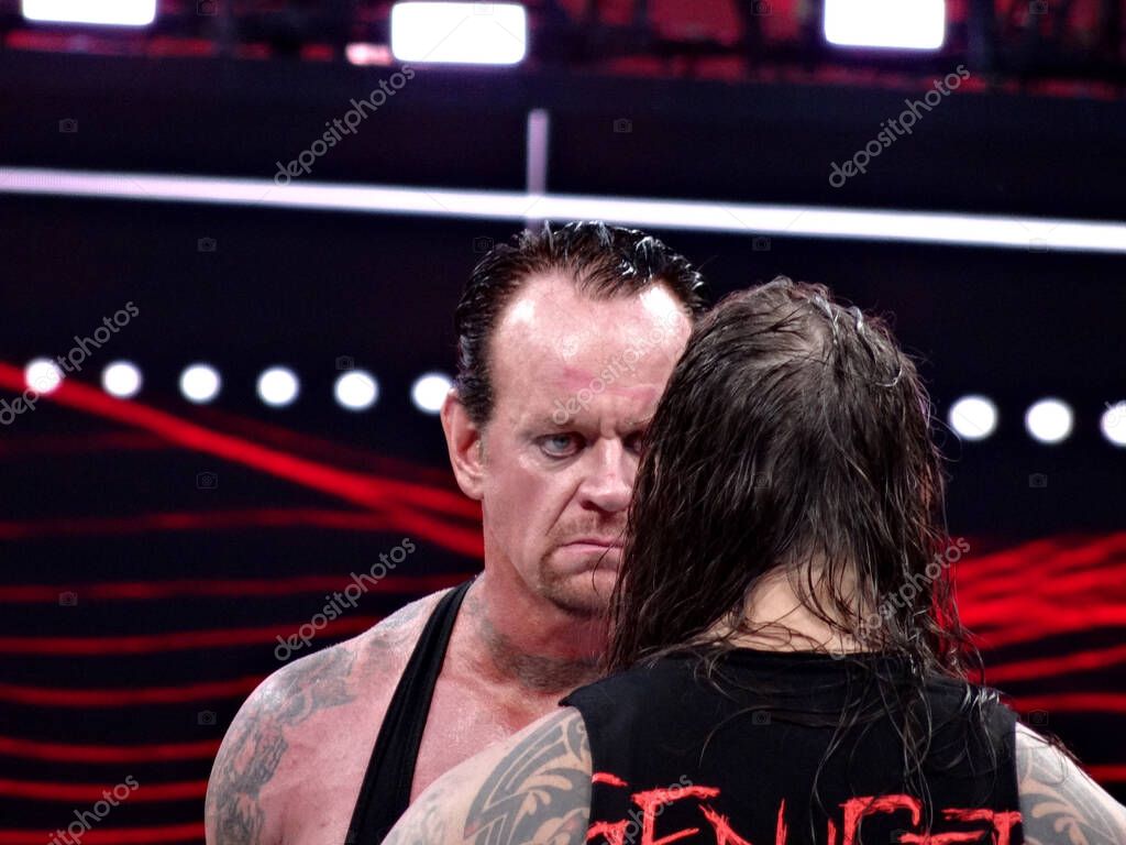 SANTA CLARA - MARCH 29: WWE Wrestler the Undertaker stares across at Bray Wyatt in ring before start of match at Wrestlemania 31 at the Levi's Stadium in Santa Clara, California on March 29, 2015.