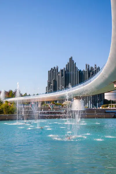 stock image Poitiers, France - September 22, 2010: Water jets and Magic Carpet building that looks like an imaginary organ in Futuroscope, a science and technology theme park in Poitiers, France