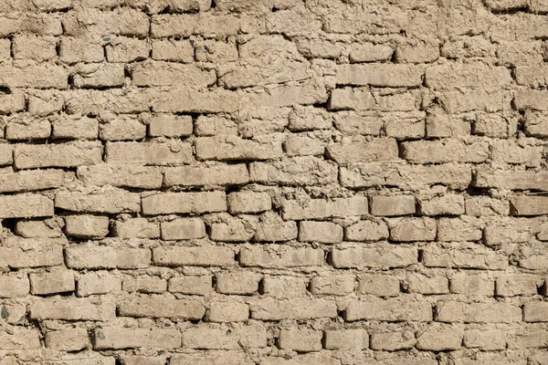 adobe air brick wall flat texture and full frame background.