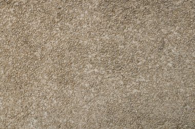 Küçük çakıl taşı sıva kaplama bitiş dokusu ve tam çerçeve arkaplan.