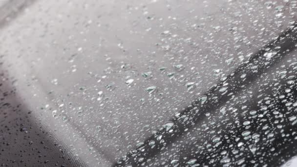 Raindrops Flowing Surface Car Windshield Close View Slow Motion — Stock Video