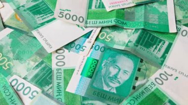 5000 Kırgızistan Som banknotunun döner arkaplanı, tam çerçeve arkaplan