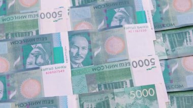 5000 Kırgızistan Som banknotunun döner arkaplanı, tam çerçeve arkaplan