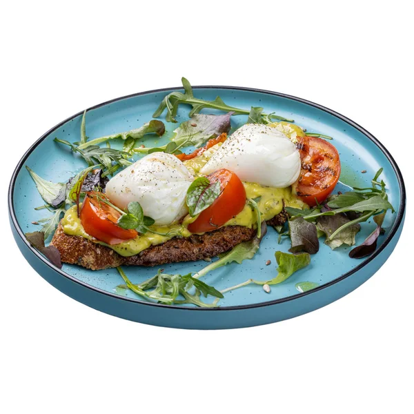 Frühstücksmenü Restaurant Pochierte Eier Auf Mehrkornbrot Mit Guacamole Tomaten Und — Stockfoto