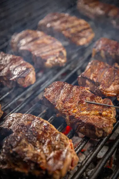 Steaks Various Stages Cooking Some Appearing More Well Done Others — Stock Photo, Image