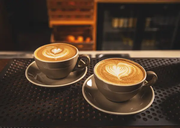 Duas Xícaras Café Mesa Arte Latte Imagem De Stock