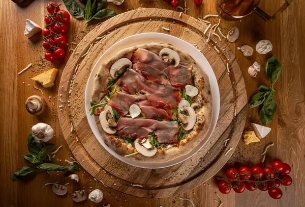 Gourmet Double Truffle Italian Pizza Rustic Wooden Table Top View 免版税图库照片