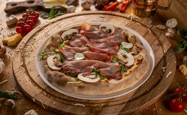 Delicious Pizza Prosciutto Mushrooms Surrounded Fresh Ingredients Stock Picture