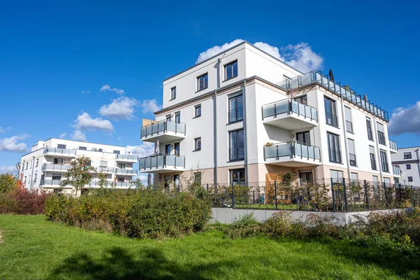 Small multi-family apartment buildings in a development area seen in Berlin, Germany