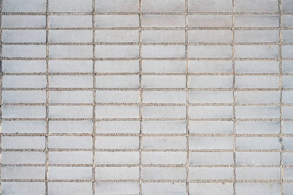 Achtergrond Van Een Muur Gemaakt Van Rechthoekige Beige Mozaïek Tegels — Stockfoto