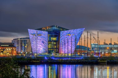 Belfast, Northern Ireland- November 3rd, 2023: The Titanic Belfast Museum illuminated at night clipart