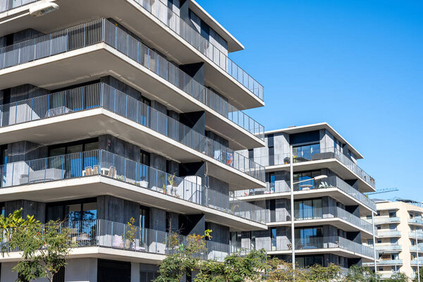 New gray apartment buildings seen in Barcelona, Spain