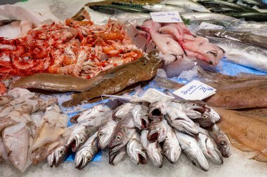 Fresh fish and seafood for sale at a market in Barcelona, Spain