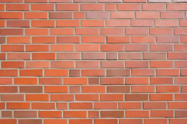 Background from a wall made of orange clinker bricks